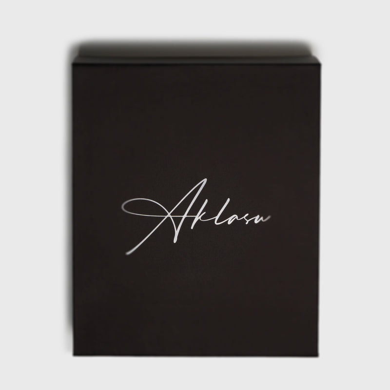 Elegant black gift box with 'Aklasu' logo in white script font.