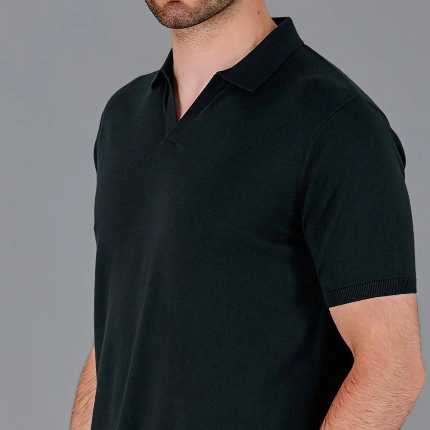 Dark green knit polo shirt ideal for stylish office outfits and staying cool at work