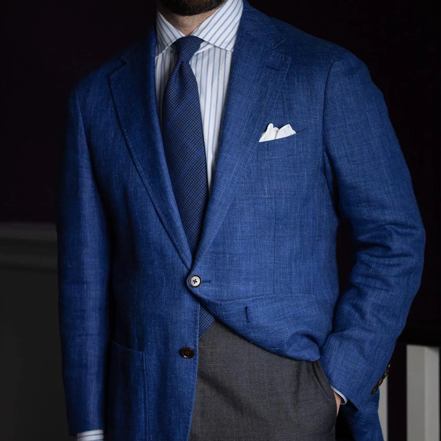 Blue linen blazer with pocket square, perfect office outfits to stay cool and confident