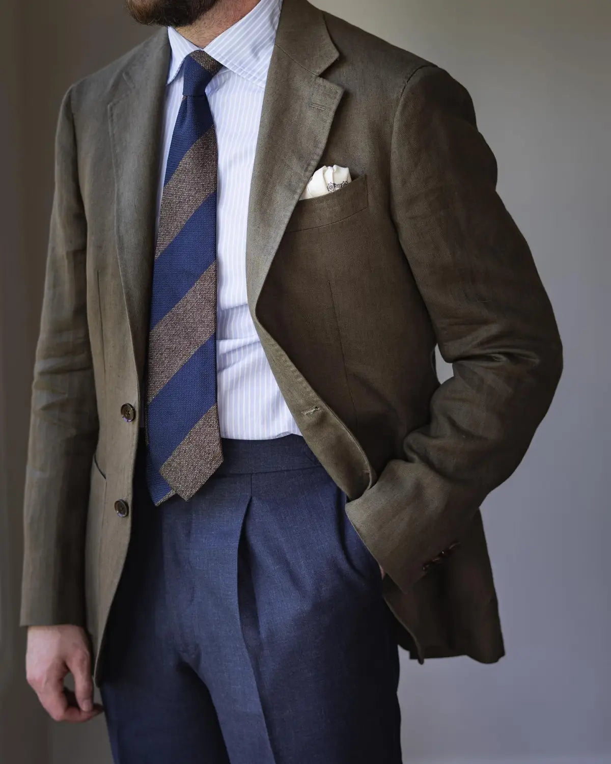Man wearing a tailored outfit showcasing timeless style and high-quality clothes