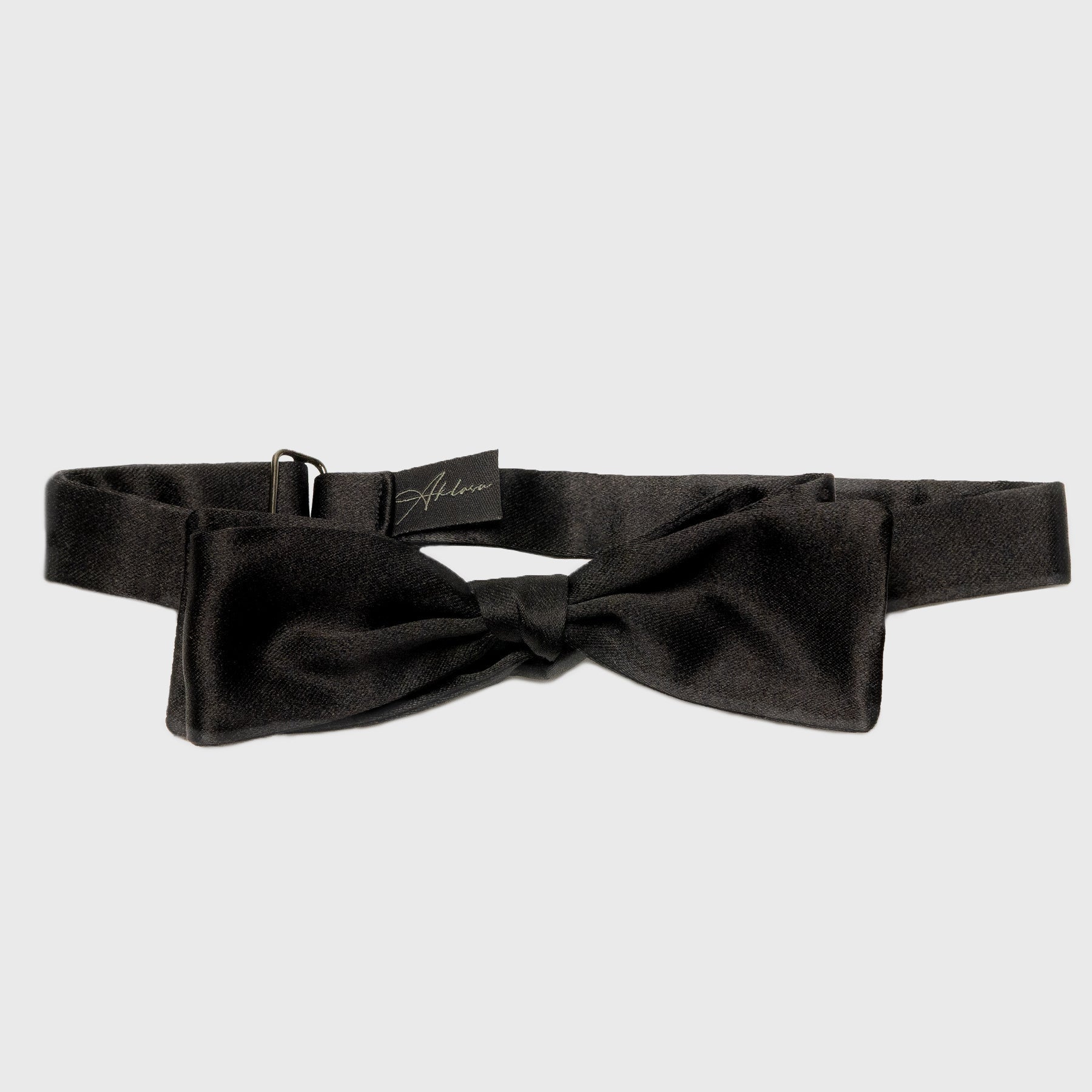 Black silk batwing self-tied bow tie.