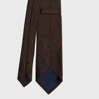 Back view of the Brown Grenadine Tie, showing the detailed stitching and inner lining.