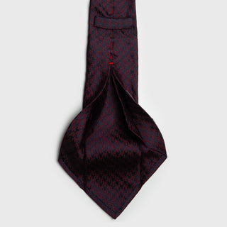 Interior view of Burgundy and Navy Houndstooth Six-Fold Silk Tie.