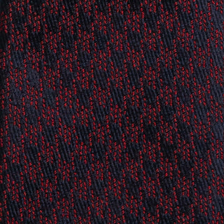 Close-up texture of Burgundy and Navy Houndstooth Silk Tie fabric.