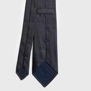 Back view of the Charcoal Grenadine Tie, highlighting the detailed stitching and label.