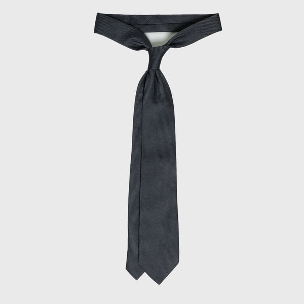 Charcoal Grenadine Tie displayed untied, showcasing its premium Italian silk craftsmanship.