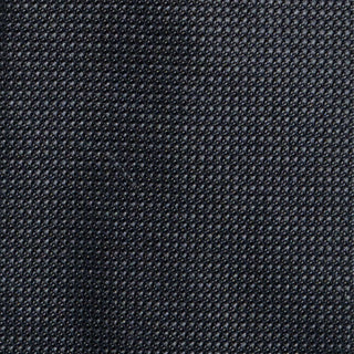 Close-up of the Charcoal Grenadine Tie's textured silk fabric for a sophisticated finish.