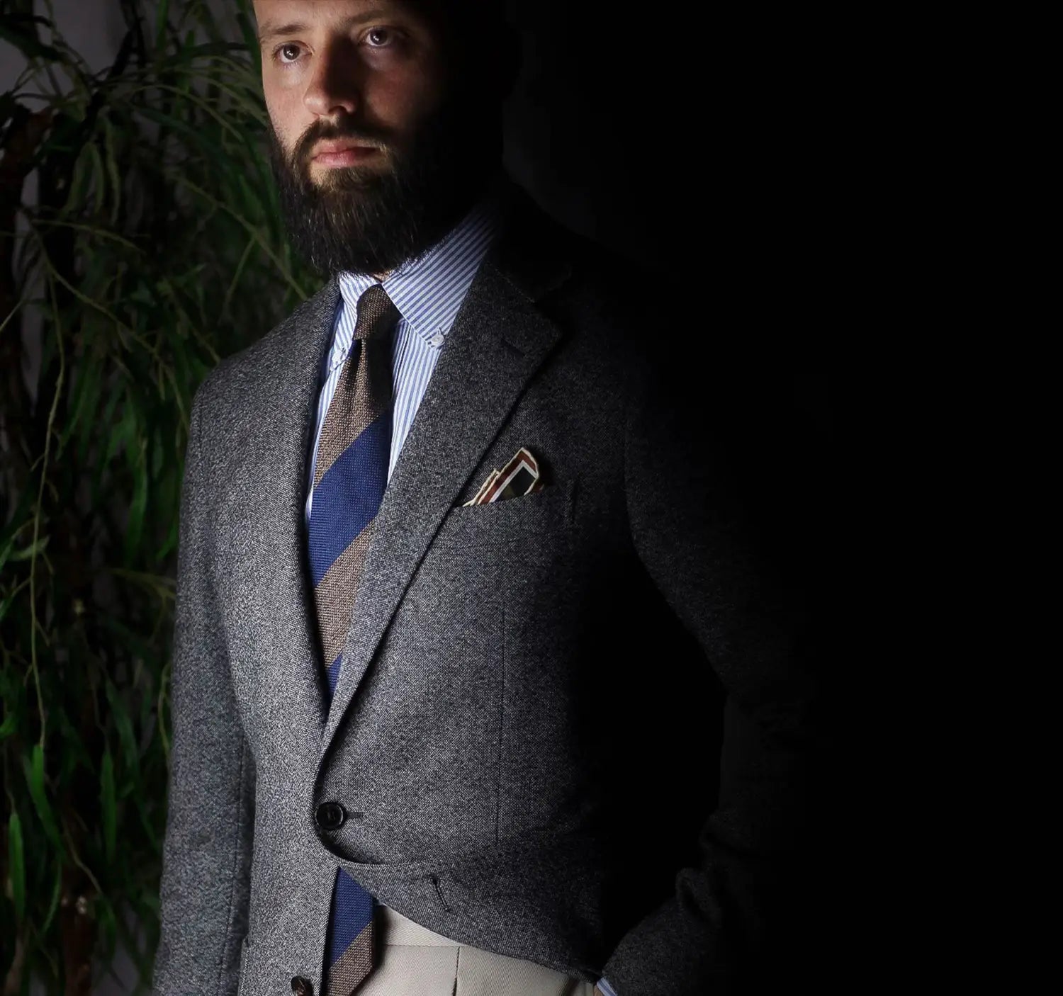 Man’s tweed suit as a stylish conference outfit for professional industry dress
