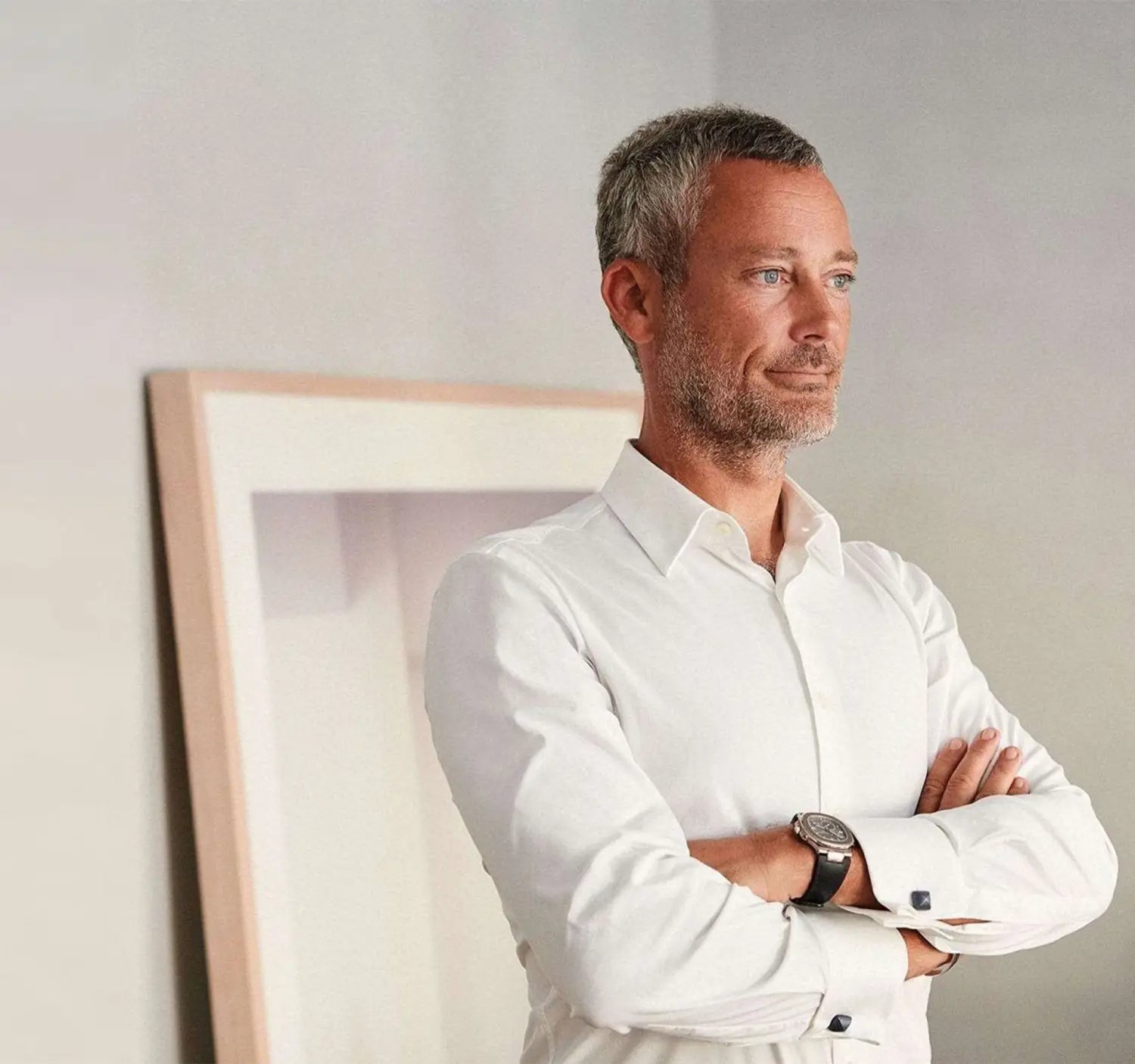 Man in white dress shirt showcasing professional conference outfit for industry events