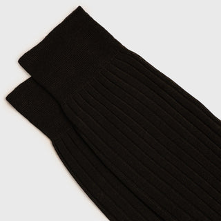 Pair of dark brown over the calf dress socks with ribbed cuffs.