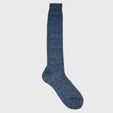 Denim blue linen over-the-calf dress socks shown at full length.