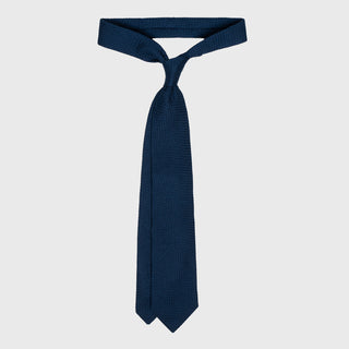 French Blue Grossa Grenadine tie knotted to showcase its elegant drape.