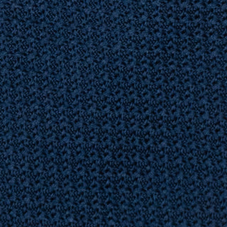 Close-up of the French Blue Grossa Grenadine tie's intricate texture.