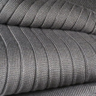 Close-up of grey dress sock fabric showcasing ribbed mercerized cotton texture.