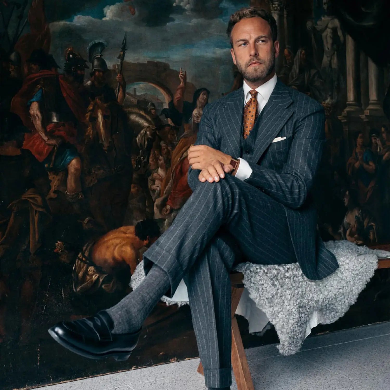 Man in pinstripe wedding suit with forest green grenadine details for your wedding day
