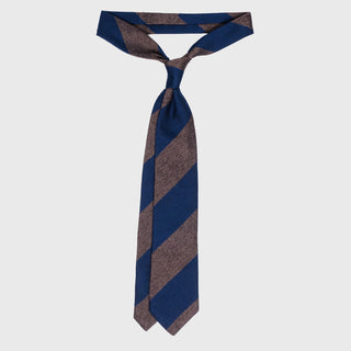 Light brown and French blue block striped grenadine tie displayed untied on a white background.