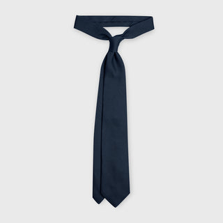 Handmade Navy Grenadine Tie displayed untied, showcasing its elegant texture.