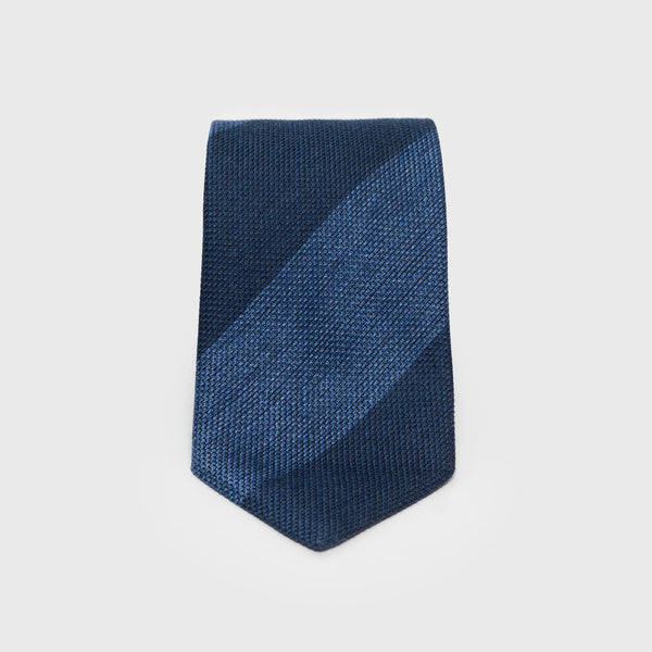 Navy and steel blue block striped grenadine tie displayed flat.