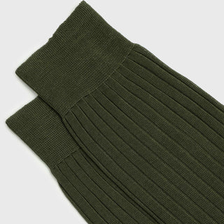 Top view of olive green dress socks with ribbed design and reinforced cuff.