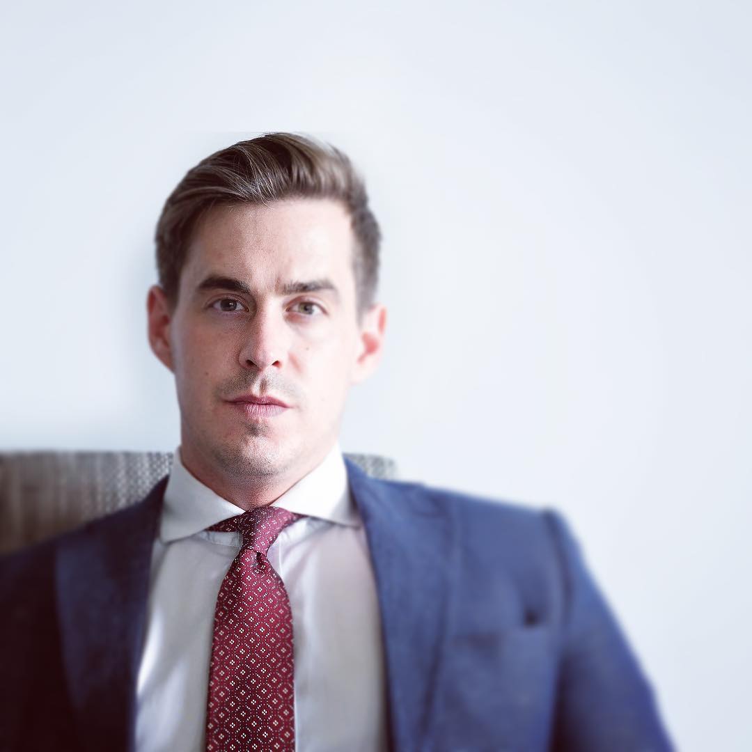 Politician outfits featuring a man in a suit and tie exuding leadership and confidence