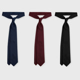 Set for Life by Aklasu, the three grenadine ties displayed flat.