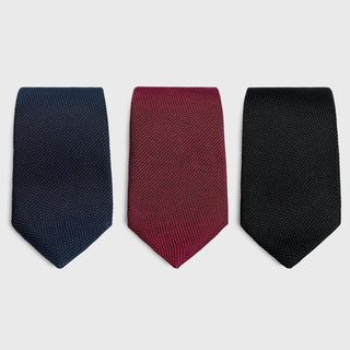 Set of three grenadine ties in navy, burgundy, and black, handcrafted from Italian silk.