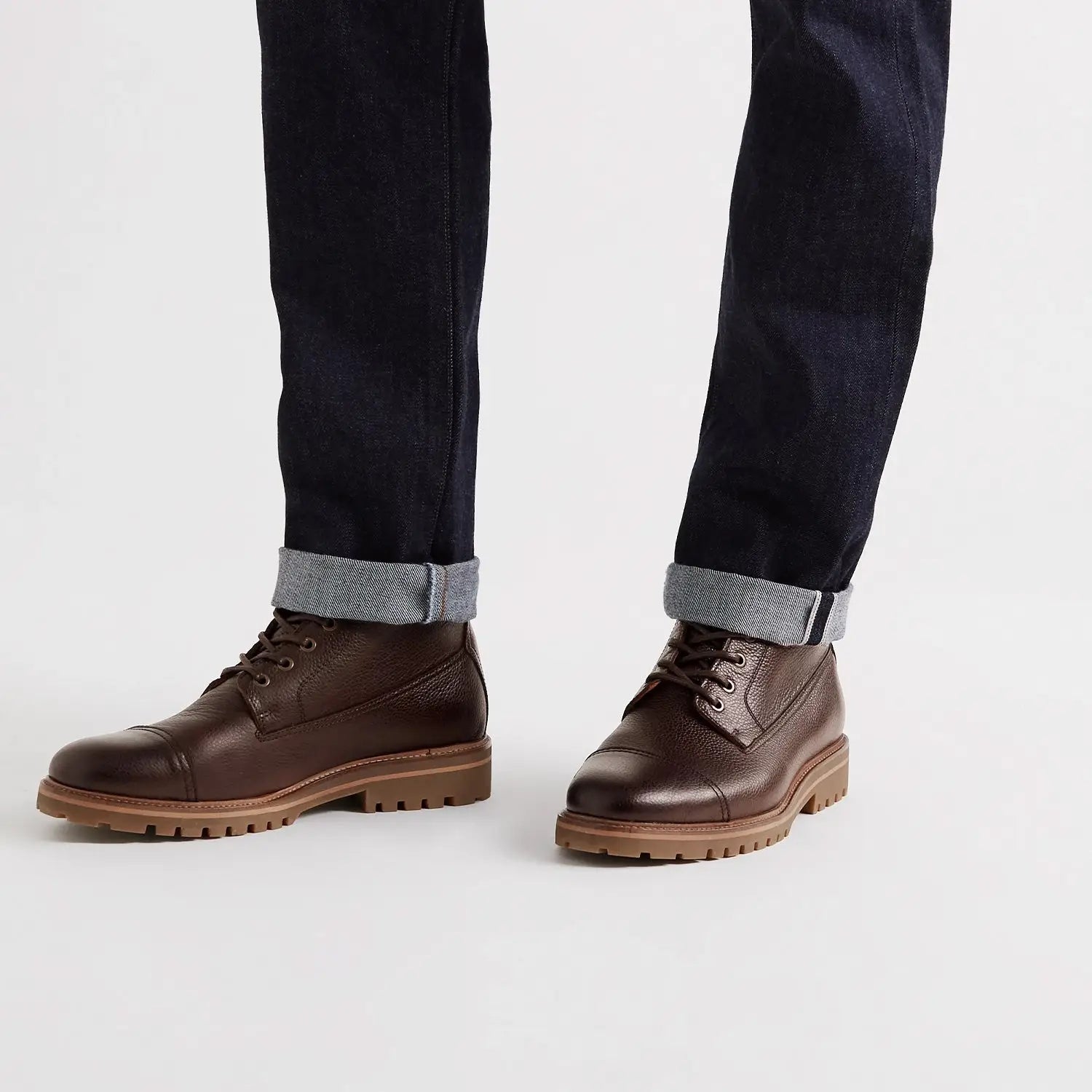 Brown leather cap-toe boots perfect for men’s wardrobe styling style