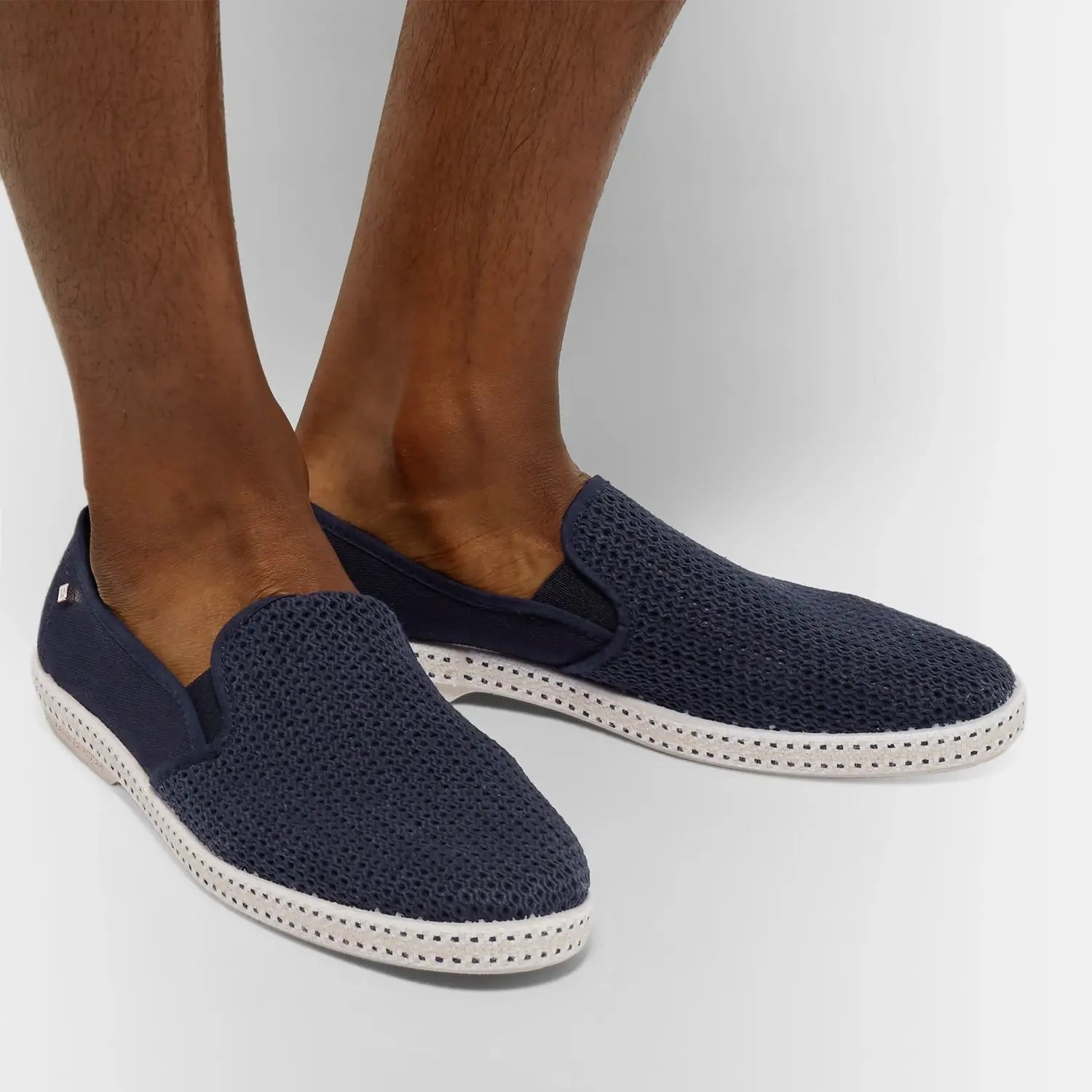 Navy blue knit slip-on shoes for men showcased in It Must Be the Shoes article