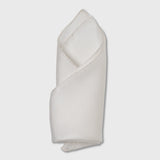 White silk pocket square, hand-rolled edge.