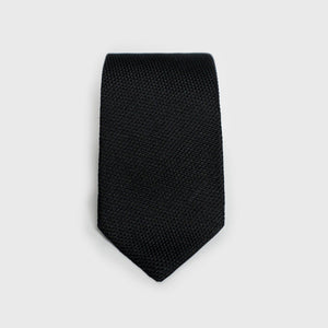 Classic black grenadine tie with a textured weave, perfect for formal occasions.