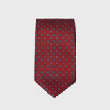 Deep red silk tie with blue floral foulard print, handmade in Italy.