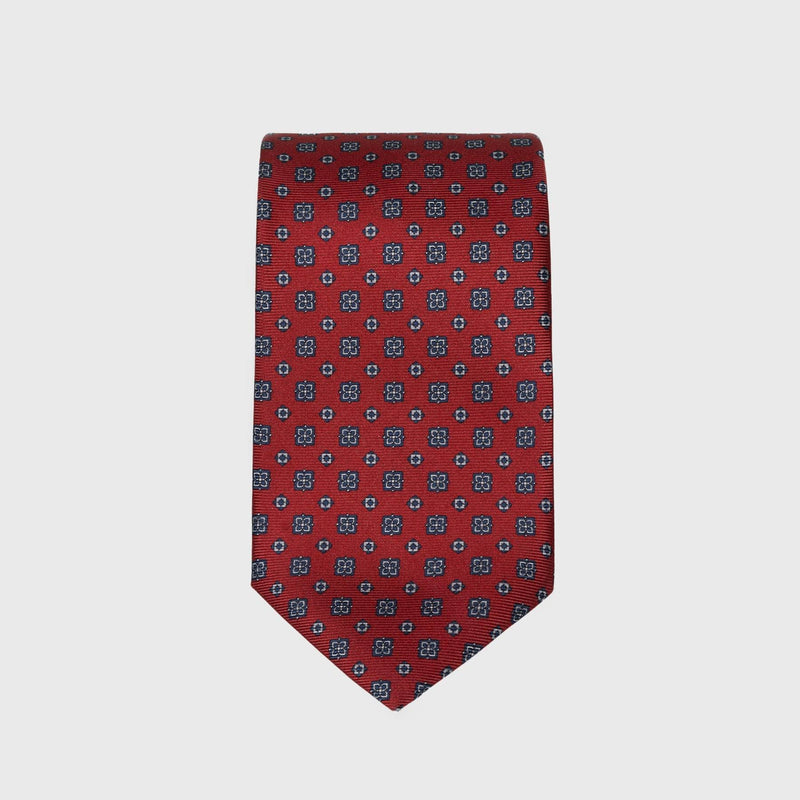 Deep red silk tie with blue floral foulard print, handmade in Italy.