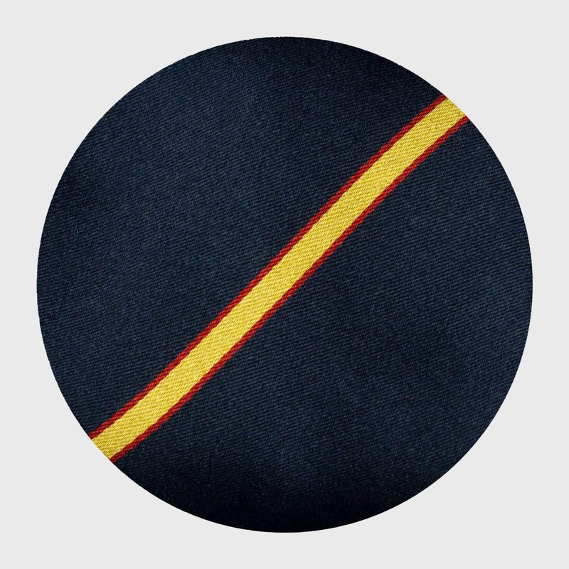 Detailed view of gold and red stripe pattern on navy blue silk fabric.