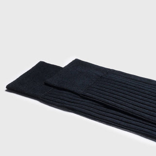 Dark Blue Dress Socks made from premium Egyptian cotton with a ribbed over-the-calf design. Elegant solid color, ideal for formal wear.