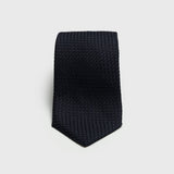Midnight Blue Grossa Grenadine Tie with textured weave, folded neatly.
