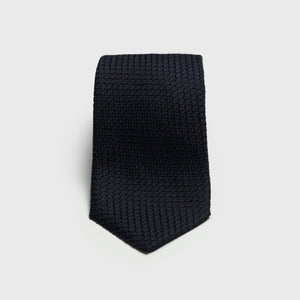 Midnight Blue Grossa Grenadine Tie with textured weave, folded neatly.