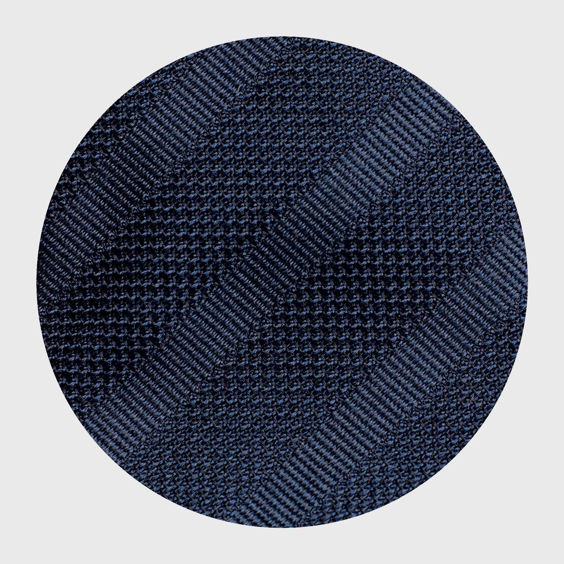 Close-up of navy blue grenadine fabric with tonal stripe texture.