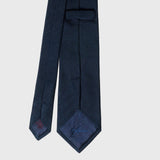 Back view of Navy Grenadine Tie with detailed stitching and label. Classic Navy Tie for Men.