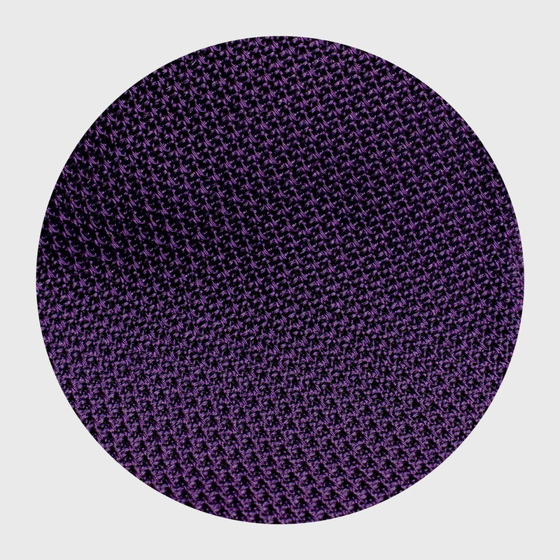 Close-up of the Purple Grenadine Tie's intricate textured silk weave.