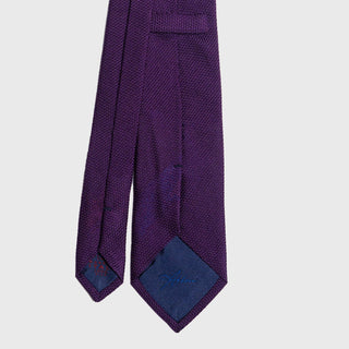 Back view of the Purple Grenadine Tie with detailed stitching and branded label.