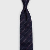 Red and white striped blue grenadine tie shown in a vertical view.