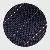 Close-up of red and white striped blue grenadine tie's textured silk fabric.