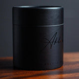 Side view of Aklasu Tie Storage Canister