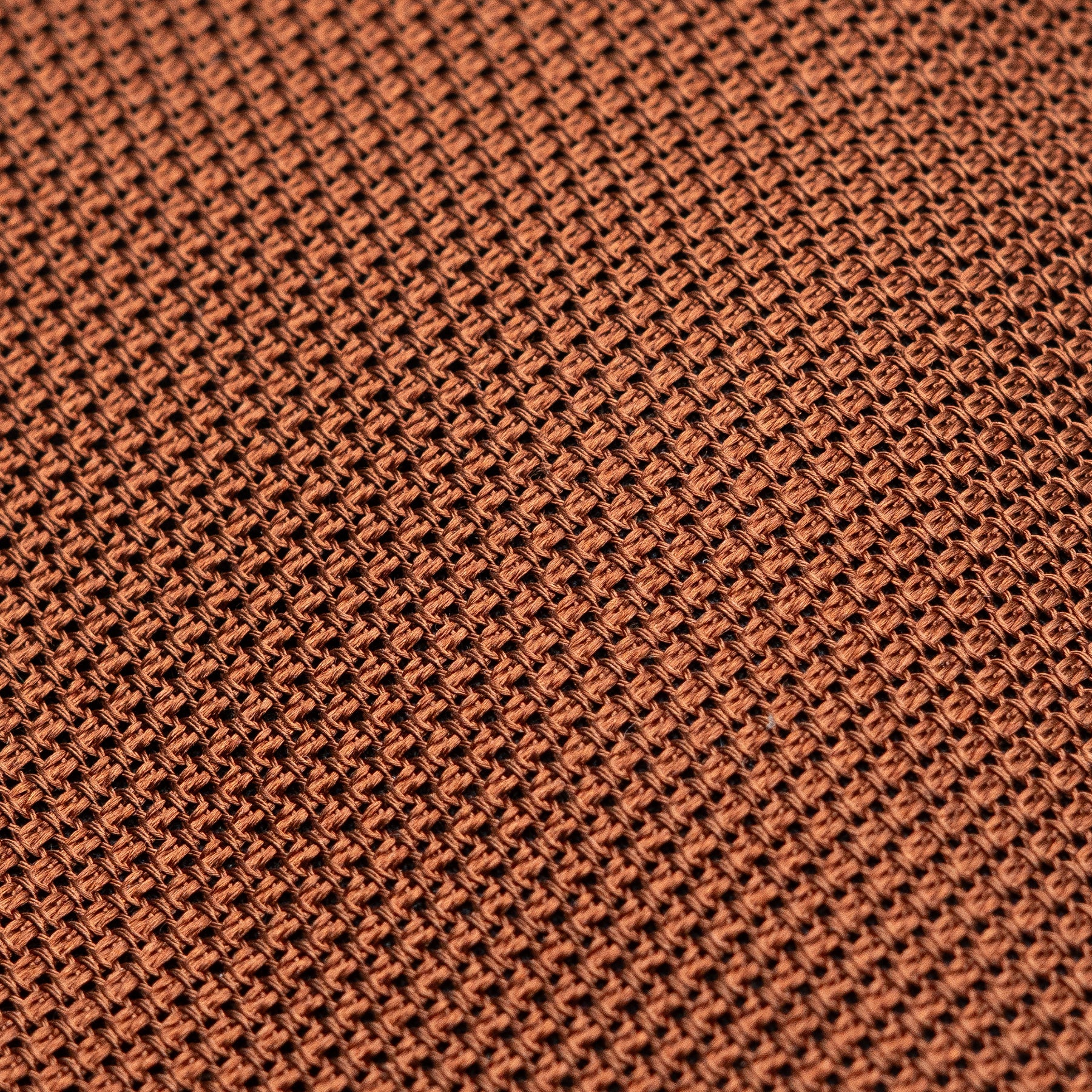 Burnt Orange Grenadine Tie fabric weave macro close-up