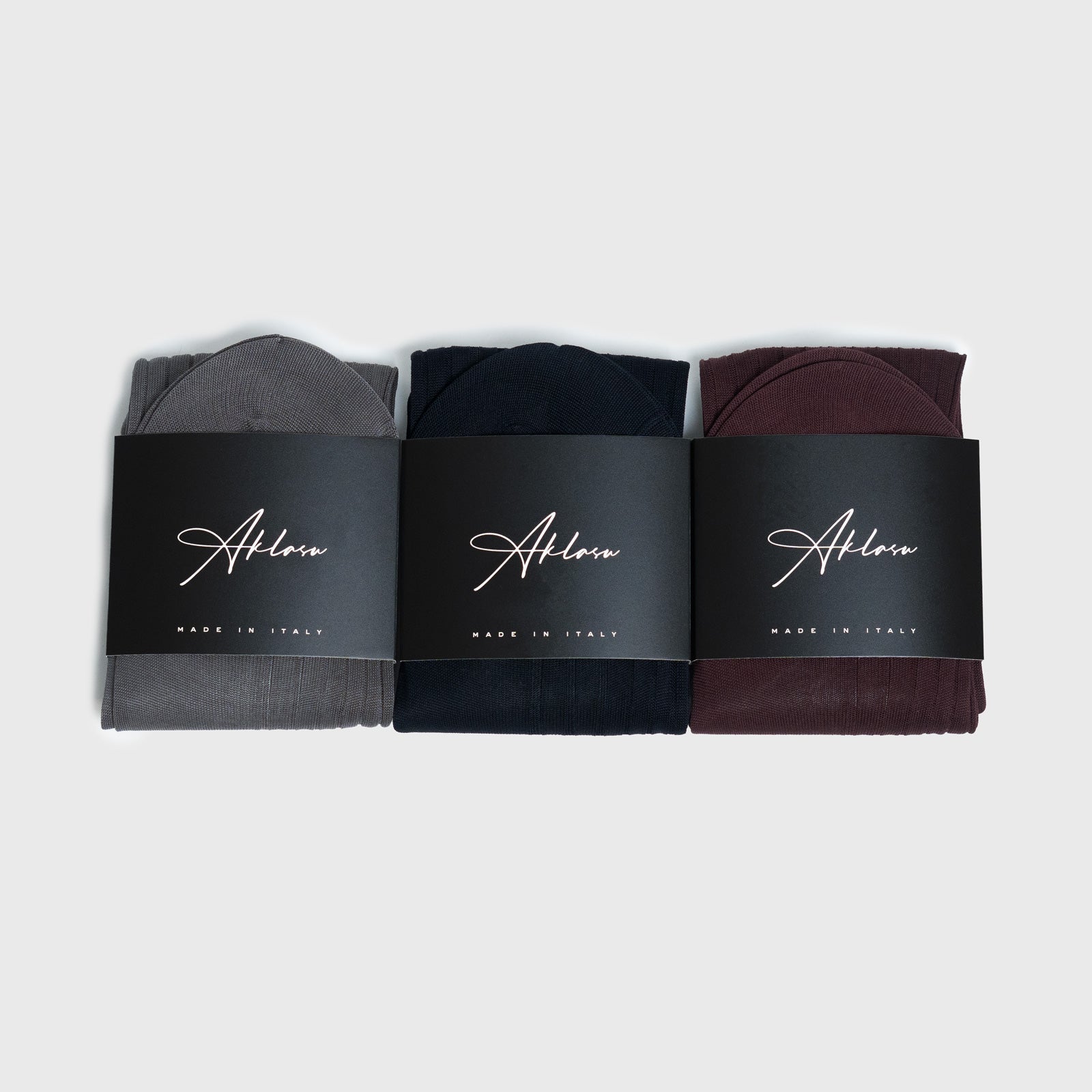 3-Sock Bundle featuring gray, navy, and burgundy dress socks with premium packaging, ideal for stylish everyday wear or gifting.