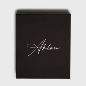 Elegant black gift box with 'Aklasu' logo in white script font.