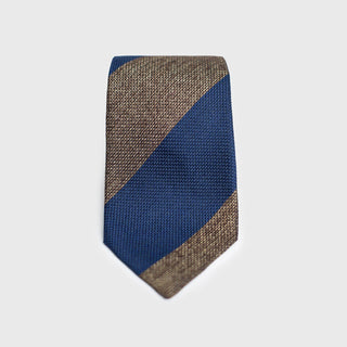 Light brown and French blue block striped grenadine tie on a white background.