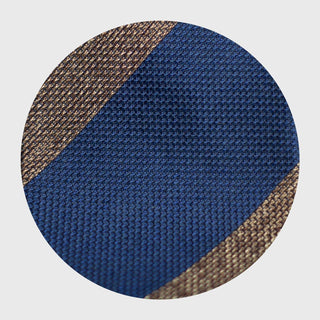 Detailed texture of the light brown and French blue block striped grenadine tie fabric.