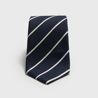 White striped deep blue six-fold silk tie with a textured finish.